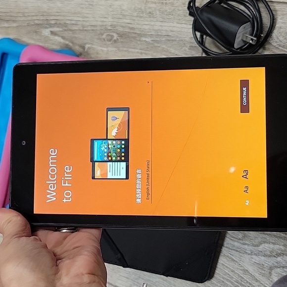 Amazon Fire Tablet with 2 Cases and a Headrest Holder - Picture 2 of 10